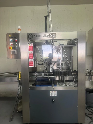 Wirehooder Robino & Galandrino Wirehooder Robino&Galand Usada — linha de engarrafamento usada para Wirehooders