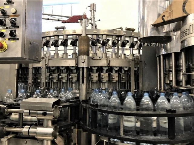 Used Sarcmi PET filling line for sparkiling and still water — 3
