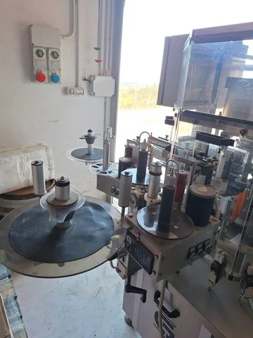 Used C&G adhesive labeller — 2