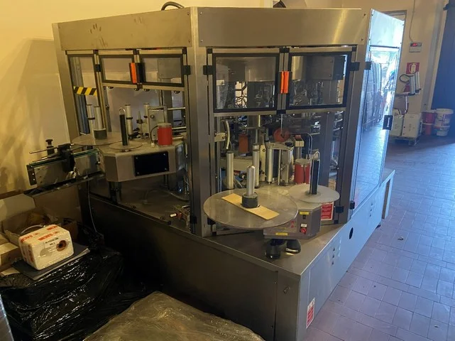 Used Sacmi adhesive labeller — 3