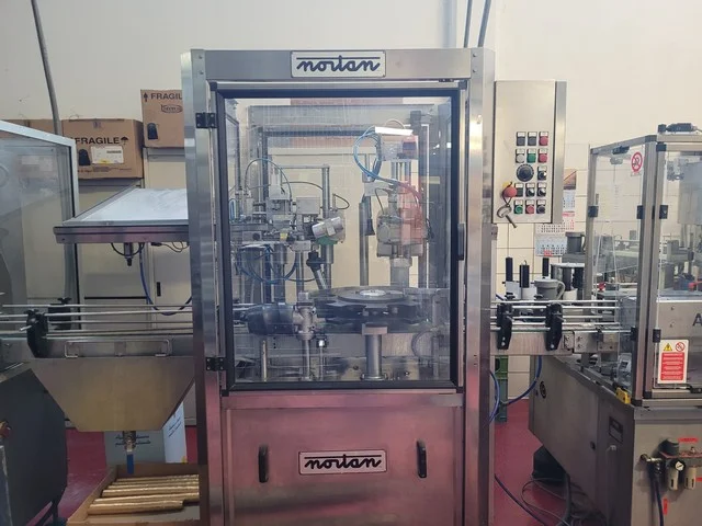 Used Nortan capsule applicator for sparkling caps and PVC capsules