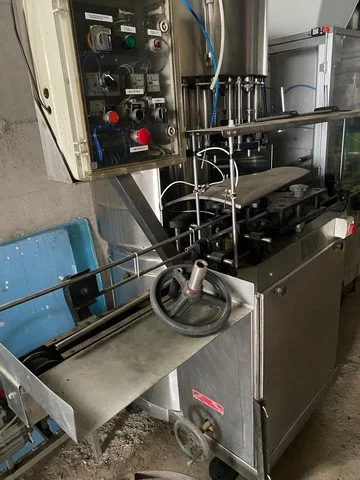 Used Cobert gravity filler