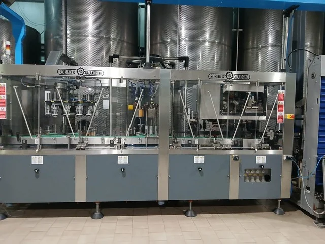Used Robino & Galandrino capsuling machine for PVC and polylaminate