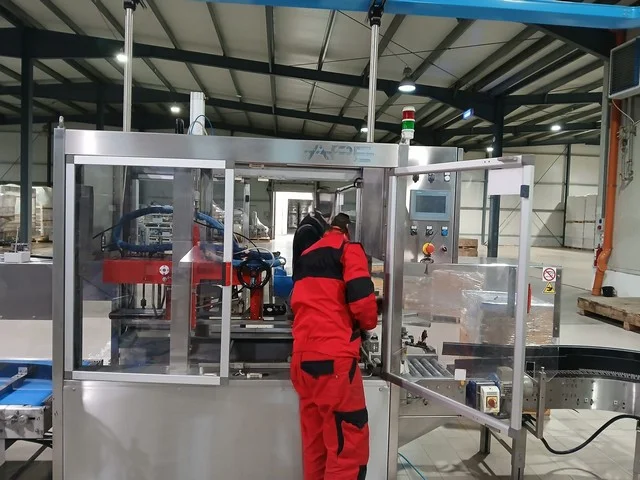 Used Ape hot melt case sealer