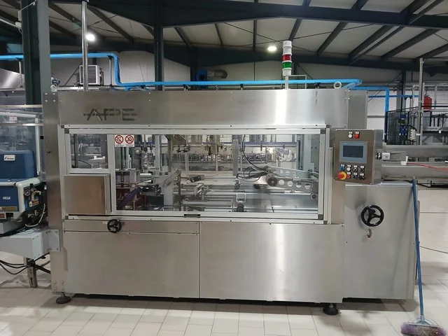 Used Ape hot melt Nordson bottom closure carton erector