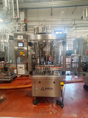 Used Arol 6-head crown capper