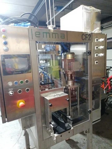Used Emma gravity can filling monoblock