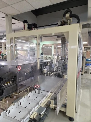 Used Cermex case packer with divider