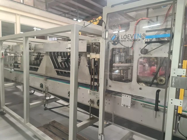 Used hot melt wrap Around Loeven