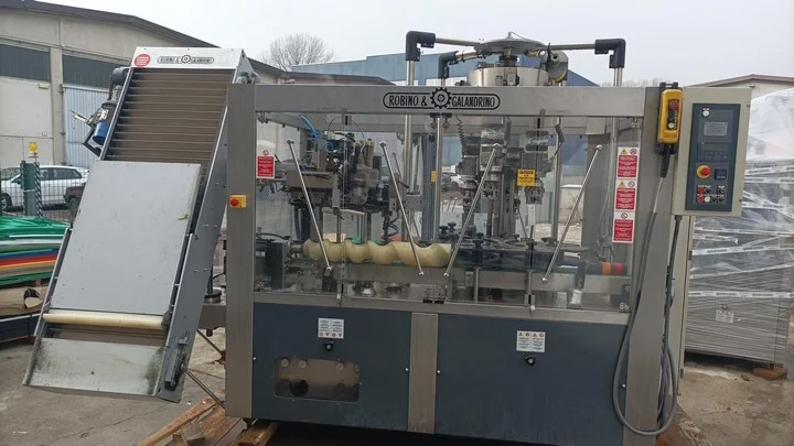 Used Robino e Galandrino capsuling machine for polylaminate and PVC capsules