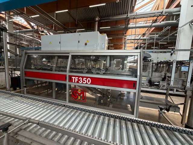 Used SMI tray packer