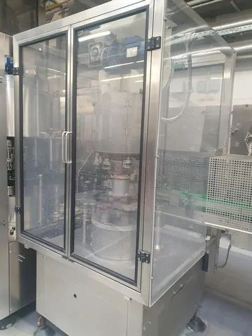 Capsuladora Bertolaso capper Bertolaso Beta 60 Usada — linha de engarrafamento usada para Cappers