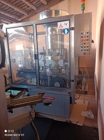 Capsuladora Bertolaso capper Bertolaso Delta 5 Usada — linha de engarrafamento usada para Cappers