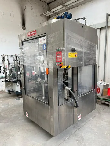 Capsuladora Bertolaso capper Bertolaso Delta 5 Usada — linha de engarrafamento usada para Cappers