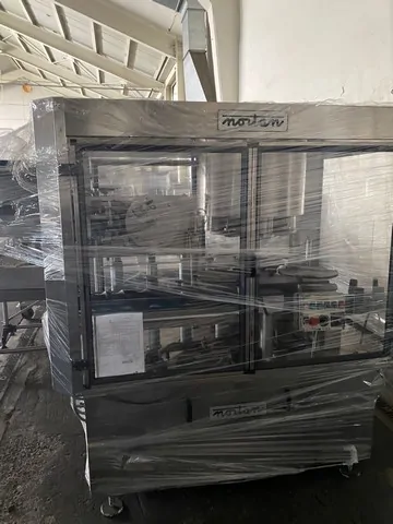 Capsuladora Nortan Capsuler Nortan 4.4 Usada — linha de engarrafamento usada para Capsuling Machines
