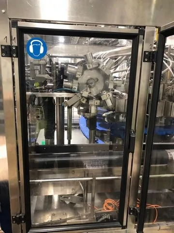 Capsuladora Nortan Capsuler Nortan Prisma 2 Usada — linha de engarrafamento usada para Capsuling Machines