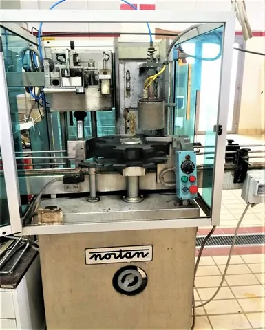 Capsuladora Nortan Capsuler Nortan Unicap 3 Usada — linha de engarrafamento usada para Capsuling Machines