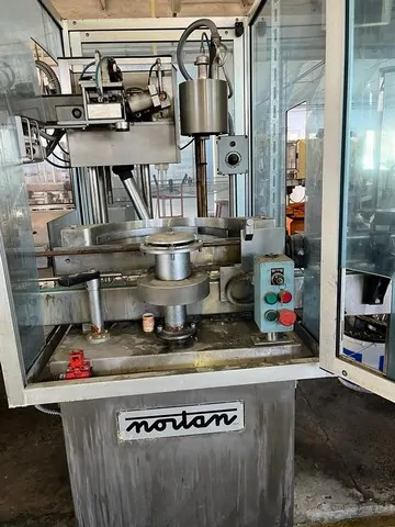 Capsuladora Nortan Capsuler Nortan Unicap 3 Usada — linha de engarrafamento usada para Capsuling Machines