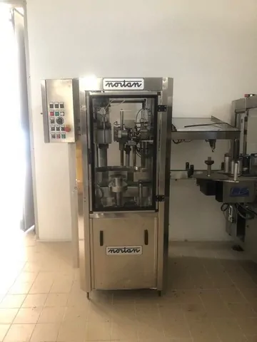 Capsuladora Nortan Capsuler Nortan Unicap 3 Usada — linha de engarrafamento usada para Capsuling Machines
