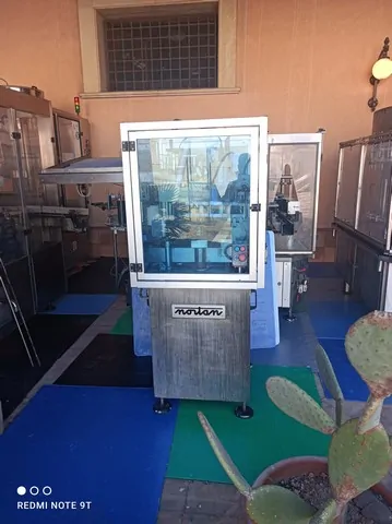 Capsuladora Nortan Capsuler Nortan Unicap Usada — linha de engarrafamento usada para Capsuling Machines