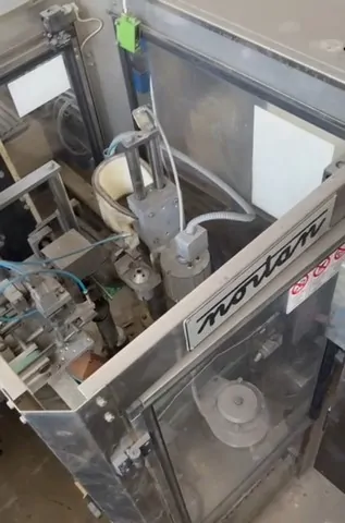 Capsuladora Nortan Capsuler Nortan Unicap Usada — linha de engarrafamento usada para Capsuling Machines