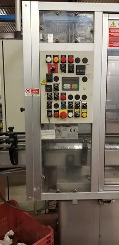 Capsuladora Robino & Galandrino Capsuler Robino&Galandri Usada — linha de engarrafamento usada para Capsuling Machines