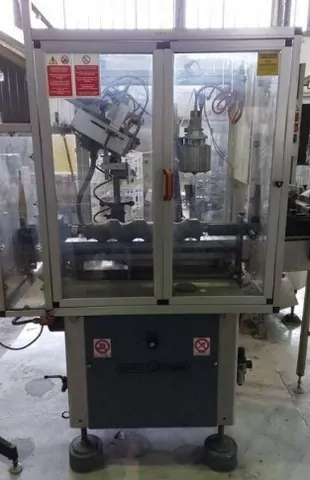 Capsuladora Robino & Galandrino Capsuler Robino&Galandri Usada — linha de engarrafamento usada para Capsuling Machines