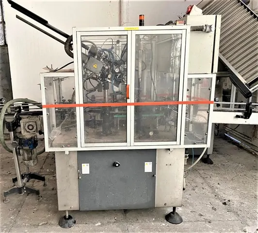 Capsuladora Robino & Galandrino Capsuler Robino&Galandri Usada — linha de engarrafamento usada para Capsuling Machines