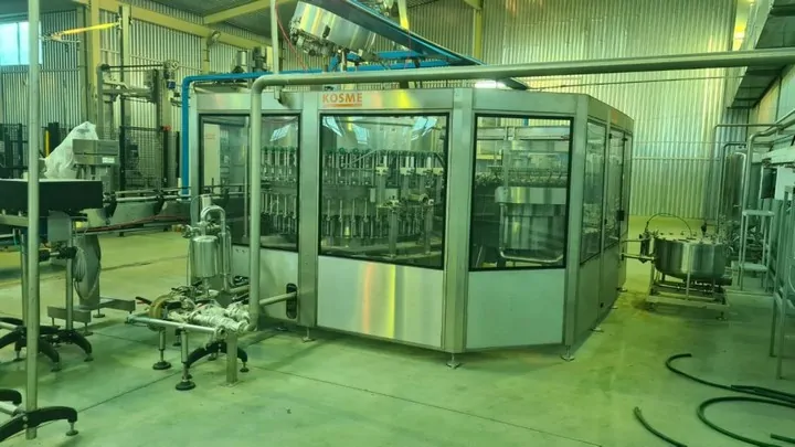 Used Complete Bottling Line Kosme 9.000 bph photo 2
