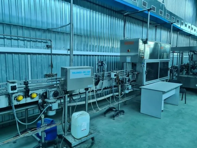 Used Complete Bottling Line Kosme 9.000 bph photo 10