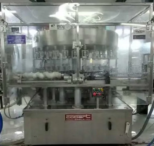 Enchedora Cobert filler Cobert Olimpia 32 Usada — linha de engarrafamento usada para Fillers