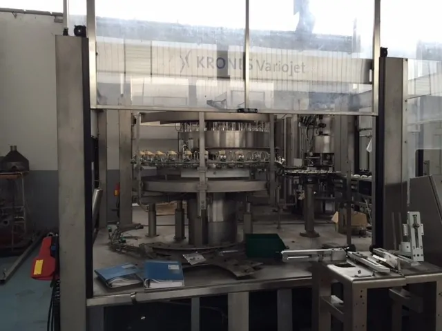 Used filling monoblock Krones vacufill PET 32.32.8 photo 2