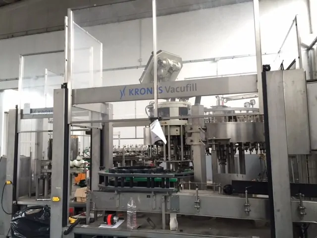 Used filling monoblock Krones vacufill PET 32.32.8 photo 3