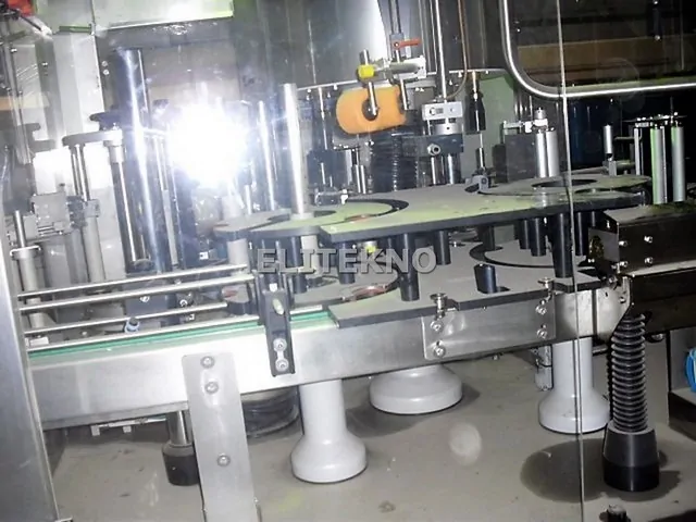 Used labeller Newtec adhesive 2.500 bph photo 2