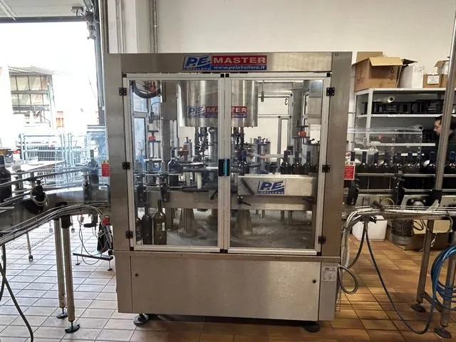 Rotuladora P.E. labeller P.E. Master m/e Usada — linha de engarrafamento usada para Labellers