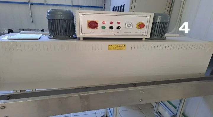Used Sleever with tunnel 6.000 bph photo 2